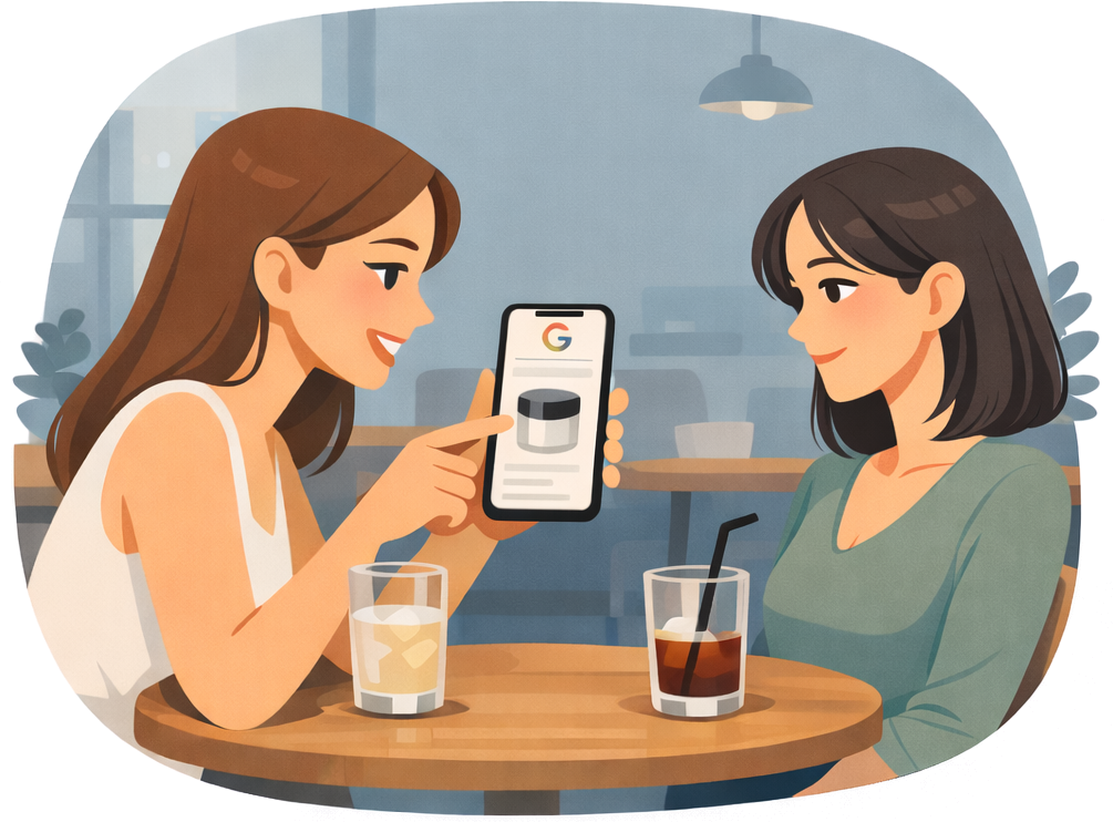 Një vajzë i tregon shoqes telefonin e saj, ku shfaqet produkti kozmetik që gjeti në Google