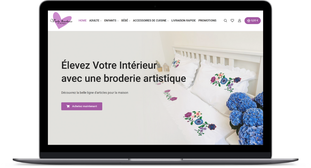 A laptop displaying Broderie Viola's homepage
